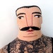 tattooed man doll