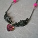 Wings of Love- a Raven-winged-heart art jewelry necklace in pink and black