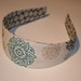 teal vintage flower and mini daisies on gray reversible hard headband