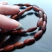 Red Tigereye Beads full strand oval tube rice tigerseye beads