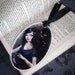 Art Bookmark- Anita Blake- Glossy, laminated oval image with black ribbon tail