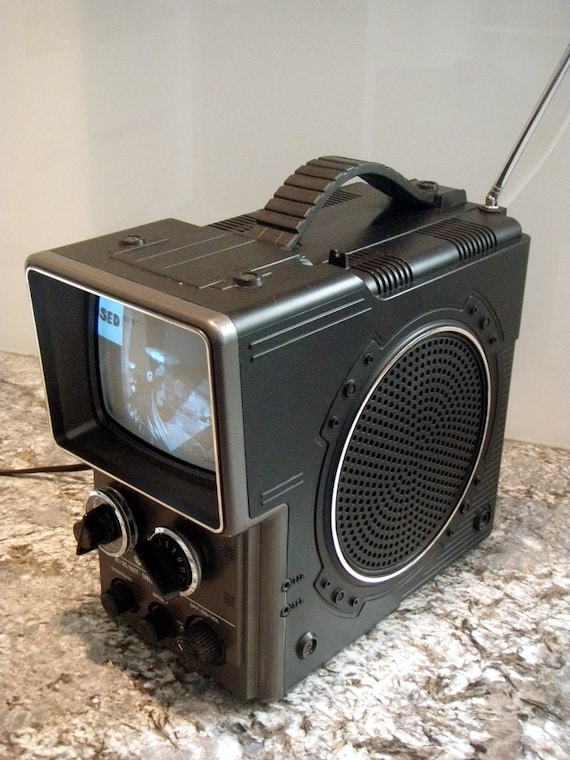 1980's portable TV. Before there were portable dvd players, iPhones