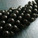 6mm Black Onyx Smooth Rounds - 11 inch Strand