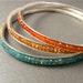 one skinny carnelian bangle