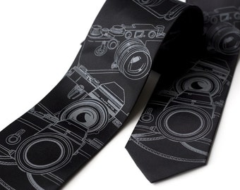 Camera necktie. Men's black tie, silkscreened old film camera print. Choose standard, narrow or skinny size. Microfiber tie.