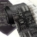 Rocket Science. Apollo cockpit silkscreen necktie. Dove gray ink.