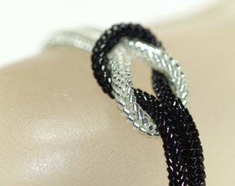 Elegance ... Bracelet . Knotted . Shiny . Jet Black . Silver Lined Crystal . Modern . Sparkle . Knot Ready for Prime Time . Magnetic Closure