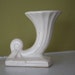 White Cornucopia Vase.