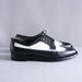 black and white wingtip brogues
