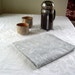 mini tablecloth in pale gray sea stars