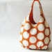 Big dots on orange tote bag