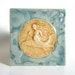 Mermaid Riding a Fish - handmade ceramic tile - turquoise and goldenrod