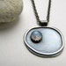 Pebble and the Moon sterling silver and rainbow moonstone pendant