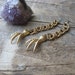 predator-- vintage claws in brass earrings