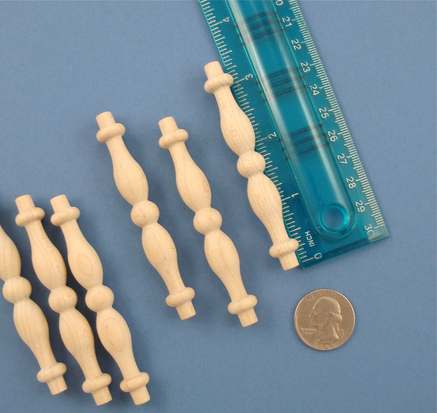 12 miniature spindles . 3 inch tall . solid unfinished wood
