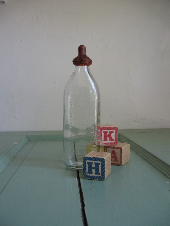 Vintage glass baby bottle with nipple Vintage glass baby bottle with nipple