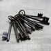 French vintage skeleton keys, fisherman's basket, and vintage book pages