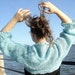 Hand knitted shrug sweater by Iryna in teal blue mohair wool
