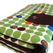 circular knitting needle organizer - elephants on green dots