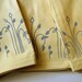 Set of 4 Butter Yellow Cloth Napkins Screen-printed with Curly Trees in Gray