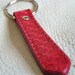 Red flowers and lines key fob