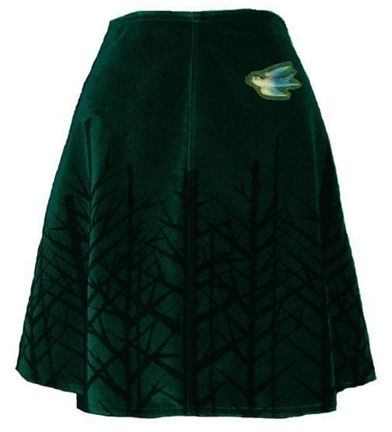 winter woods skirt pine green bare trees hand screen