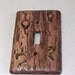 Bark of a tree light switch cover