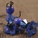 frosted bright royal blue flowers with swarovski crystals and stone earrings