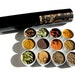 large magnetic indian spice kit with recipes included. the flavors of India at home in your kitchen.