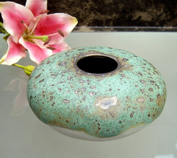 round Ikebana vase with flower frog pin frog kenzen in
