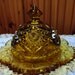 Early American pressed glass round butter bowl in amber