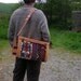 carpet bag veg tan hide and antique rug