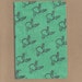 Hand stamped cat cleaning crotch notebook like moleskin green