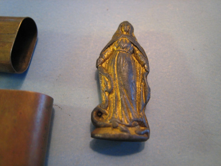 miniature virgin mary statue