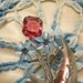 40s model vintage enamel and rhineStone flower brooch . blue enamel and rhinestones with red ruby jewel