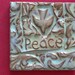 peace with a dove handmade earthenware tile
