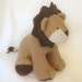 larry the lion talking stuffed animal