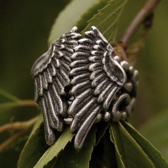 Items similar to Silver Folded Wings Ring on Etsy
