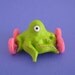 Green One Eyed Octopus on Wheels - Mini Sculpture - LAST ONE