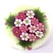 Polymer clay bouquet of pink flowers cane