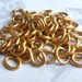 LAST Set - Raw Brass Jump Rings - 7mm x 6mm - 20 grams - (approx 250x) (F571)