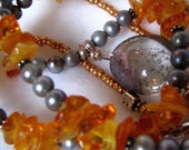 Ice and Gold, amber and freshwater pearls, with a gorgeous quartz teardrop pendant.