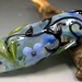 HANDMADE Lampwork Glass FOCAL Bead Donna Millard green purple leaves flowers
