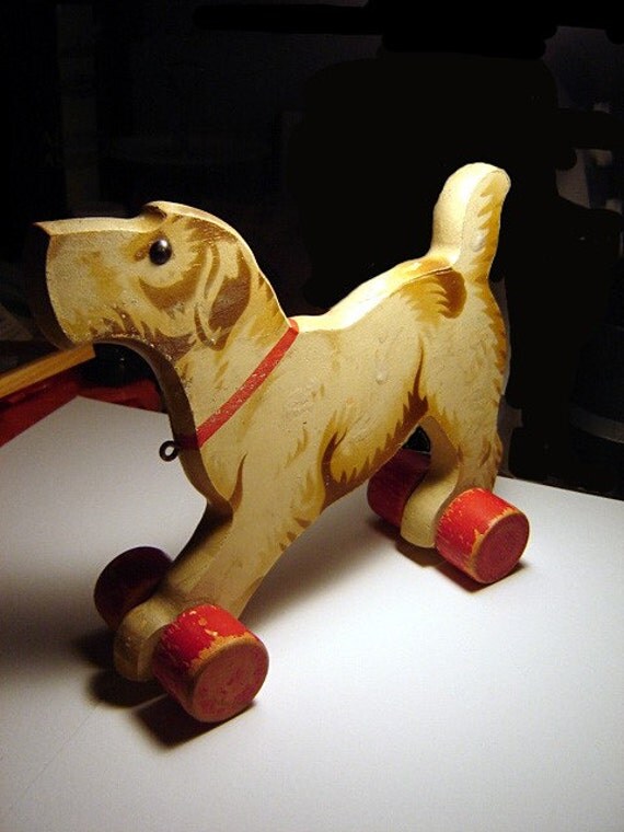 vintage wooden dog pull toy made by Gecevo red wheels