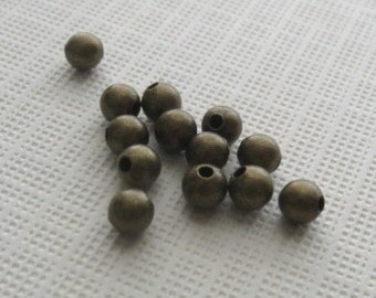 50 Antiqued brass 3mm round smooth beads