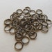 40 Antiqued brass 8mm 18 gauge soldered closed jumprings