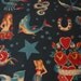 Tattoo Fabric on Black - By the Yard
