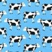 Pink Light Design, Menagerie, Cows on Blue Fabric - By the Yard
