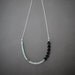 petite onyx pyrite crystal and magnesite necklace with sterling silver chain geometric