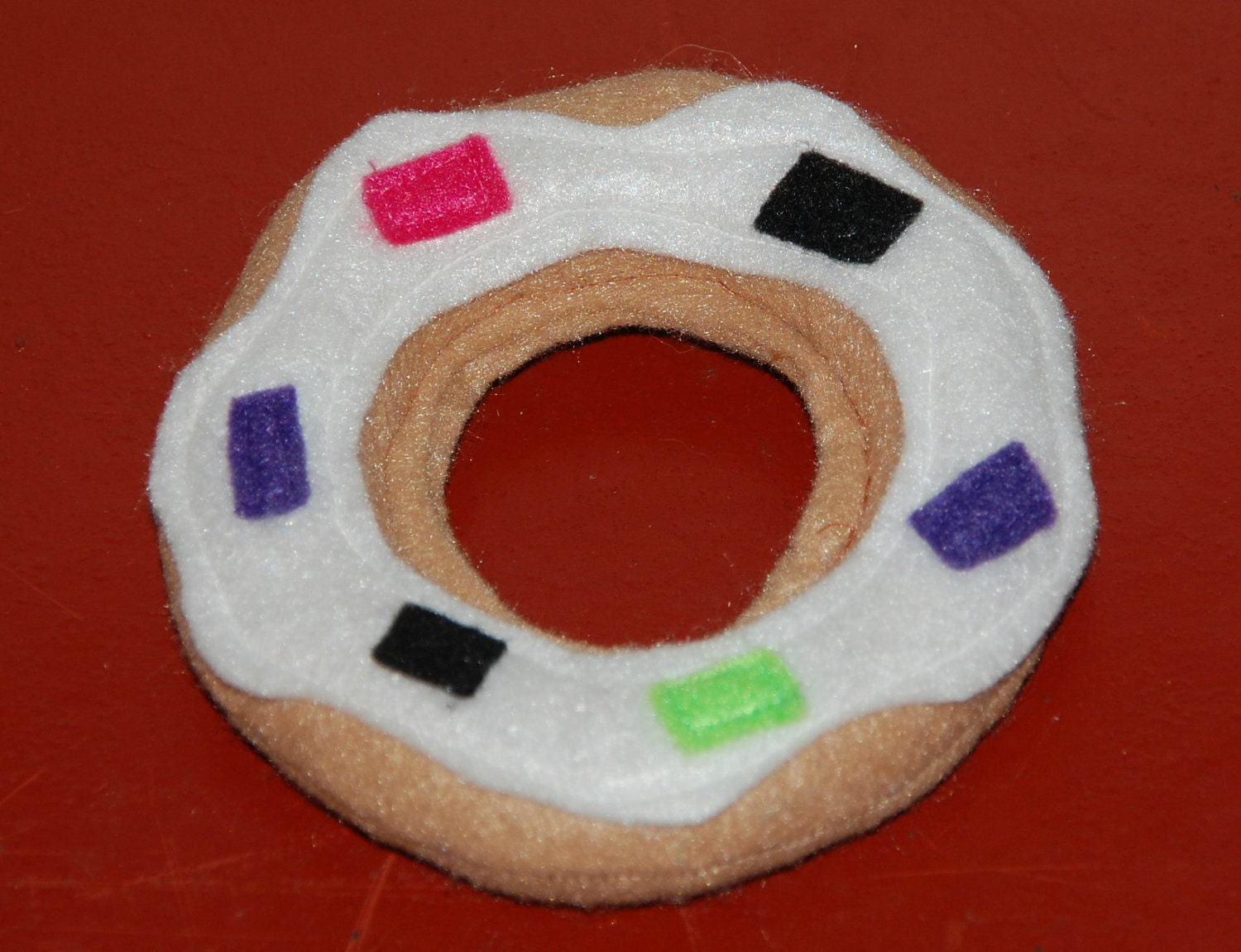 plush ring dog toy